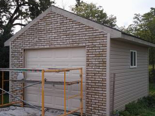 Garage with Brick Facing